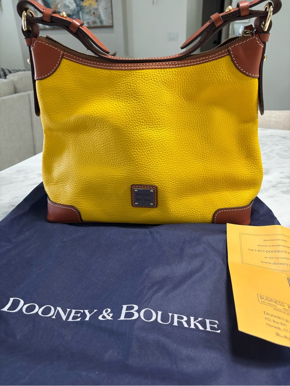 Dooney & Bourke Yellow Leather Shoulder Bag with Brown Trim and Gold Hardware
